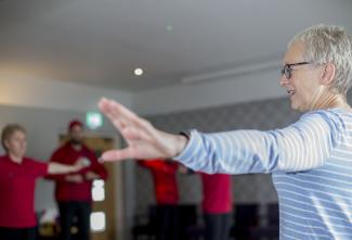 Ettaline teaching a Qigong class