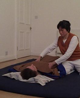 Dawn giving a Shiatsu treatment
