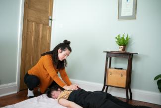 Zoe Rosenthall Giving Shiatsu